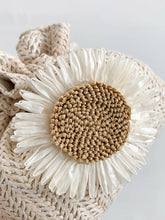 Woven Drawstring Purse with Floral Embellishment