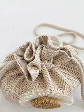 Woven Drawstring Purse with Floral Embellishment