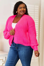Neon pink drop shoulder cardigan with ribbed knit and balloon sleeves
