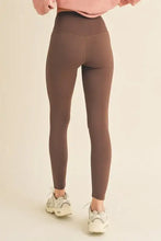Yelete full size fleece lined high-waisted leggings in brown with white sneakers