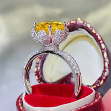 Yellow 1-carat moissanite sterling silver ring in red velvet box