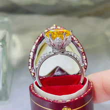 18-karat white gold sterling silver ring with large yellow diamond