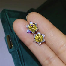 Yellow starburst sterling silver stud earrings with white accents