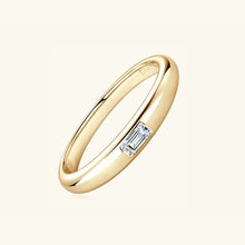 Polished yellow gold baguette diamond ring with silver inlaid moissanite