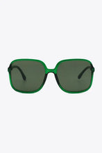 Yellow square sunglasses with green frame, dark lenses, black temples