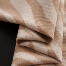 Beige animal print polyester scarf with plaid blanket texture