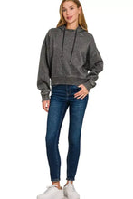 Gray distressed cropped zenana acid wash fleece hoodie with black drawstrings and ribbed cuffs for casual pairing advice