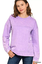 Lavender-colored soft cotton french terry sweatshirt with relaxed fit and subtle acid wash distressing details