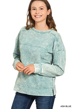 Ash blue distressed cotton sweatshirt featuring acid wash french terry fabric with subtle exposed seam detailing