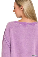 A soft lavender zenana acid washed fleece sweatshirt with oversized knit and acid washed batwing sleeves and ribbed crew neck
