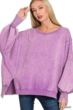 A soft lavender zenana acid washed fleece sweatshirt with batwing sleeves and ribbed cuffs for a casual vintage look