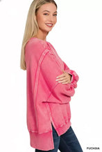 Fuchsia-colored oversized fleece sweatshirt with relaxed fit ribbed cuffs and batwing sleeve from zenana