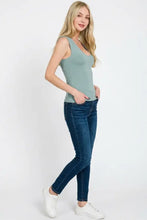 A sleek light green sleeveless v-neck double layered tank top with a fitted silhouette by Zenana