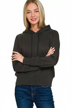 Black hooded sweatshirt with drawstrings and ribbed cuffs in modern style scuba hoodie by Zenana