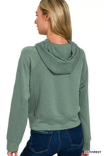 Soft sage green zenana drawstring scuba hoodie with raglan sleeves and relaxed fit pairing suggestions included