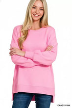 Candy pink fleece hi-low sweatshirt with oversized crewneck long sleeves and front pockets from zenana with pairing tips