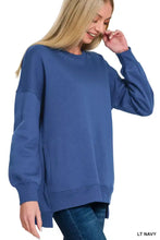 A soft light navy blue zenana fleece hi-low boyfriend sweatshirt with pockets and ribbed cuffs, ideal with ankle boots
