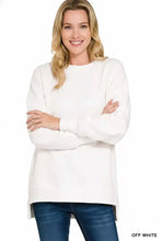 Off white fleece boyfriend sweatshirt with relaxed fit high-low hemline pockets and slightly stretchy fabric for best fit
