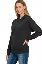 Black oversized zenana fleece kangaroo pocket hoodie with front pocket and ribbed cuffs for casual wear