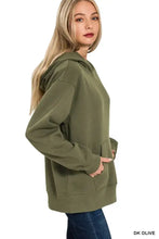 Dark olive zenana fleece hoodie with kangaroo pocket and relaxed fit ideal for casual layering and pairing suggestions