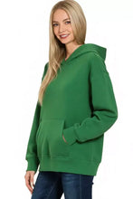 Green zenana fleece kangaroo pocket hoodie with front pockets and ribbed cuffs made from soft fleece material
