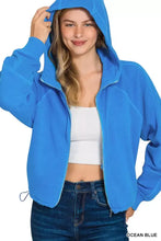 Zenana ocean blue fleece hoodie with pigment dye, soft fleece texture, zip-up front, ribbed cuffs, and pockets
