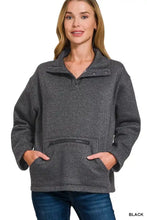Black heathered fleece pullover sweatshirt with high neck design buttoned collar and front zipper kangaroo pocket