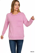 A soft mauve zenana pullover in cotton french terry with raw edge detail and a front patch pocket