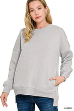 A soft heather gray zenana full size fleece hi-low boyfriend sweatshirt with relaxed fit ribbed cuffs and pockets