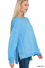 Deep sky blue oversized pullover with relaxed fit ribbed cuffs and contrasting french terry pigment side panels