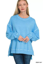 A deep sky blue oversized sweatshirt in french terry pigment dye with ribbed cuffs and relaxed fit by zenana
