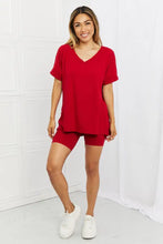 Zenana burgundy quiet moments brushed lounge set featuring a red v-neck top and matching biker shorts