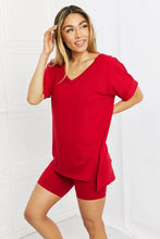 Zenana full size quiet moments brushed lounge set in burgundy featuring red v-neck top with side slit and matching biker shorts