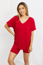 Red oversized v-neck short-sleeved top and matching biker shorts from zenana quiet moments brushed lounge set in burgundy