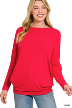 A vibrant ruby red zenana hacci dolman sleeve top with long sleeves and a relaxed sleeve boat neck design