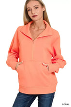 Coral-colored zenana fleece sweatshirt with half-zip, ribbed cuffs, kangaroo pocket, and collar for best fit