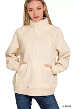 Beige zenana half zip fleece sweatshirt with kangaroo pocket ribbed cuffs hem and mesh panel detailing on shoulders