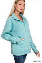 Zenana half zip fleece sweatshirt in dusty teal features ribbed texture panels and a kangaroo pocket