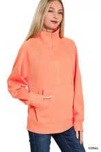 Coral-colored zenana half zip fleece sweatshirt with ribbed panels and kangaroo pocket for best fit and comfort