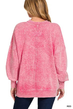 Pink vintage wash distressed sweatshirt with cross-back design and ribbed cuffs made from french terry fabric view of back