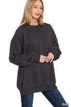 Black zenana oversized fleece tunic sweatshirt with relaxed fit ribbed cuffs and fleece interior for cozy layering