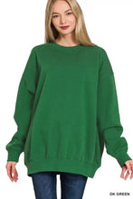 Dark green zenana oversized fleece tunic sweatshirt with relaxed fit and ribbed cuffs perfect for pairing with ankle boots