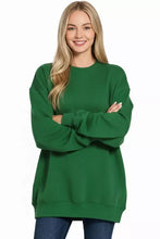 Green fleece tunic sweatshirt with ribbed cuffs and crewneck from zenana designed for casual wear with ankle boots