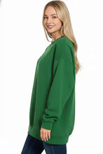 Zenana oversized round neck fleece tunic sweatshirt in soft solid green with relaxed fit and ribbed cuffs perfect for ankle boots