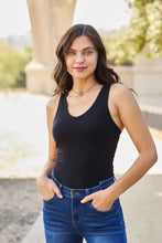 Black sleeveless Zenana racerback tank bodysuit with scoop neckline and fitted silhouette for versatile layering