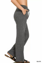 Black ribbed drawstring lounge pants by Zenana featuring wide-leg fit and comfortable knit fabric