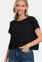 Zenana round neck short sleeve crop t-shirt on woman in blue jeans