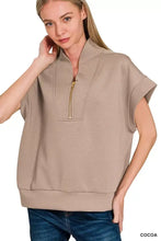 Beige zenana scuba high neck half zip top with sleeveless design, relaxed fit, and ribbed hem