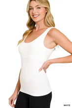 White seamless cami tank top with scoop neckline and built in bra made from smooth form fitting fabric