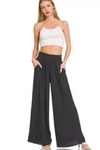 Black Zenana smocked waistband wide leg lounge pants with elastic waistband and side pockets for comfortable wear